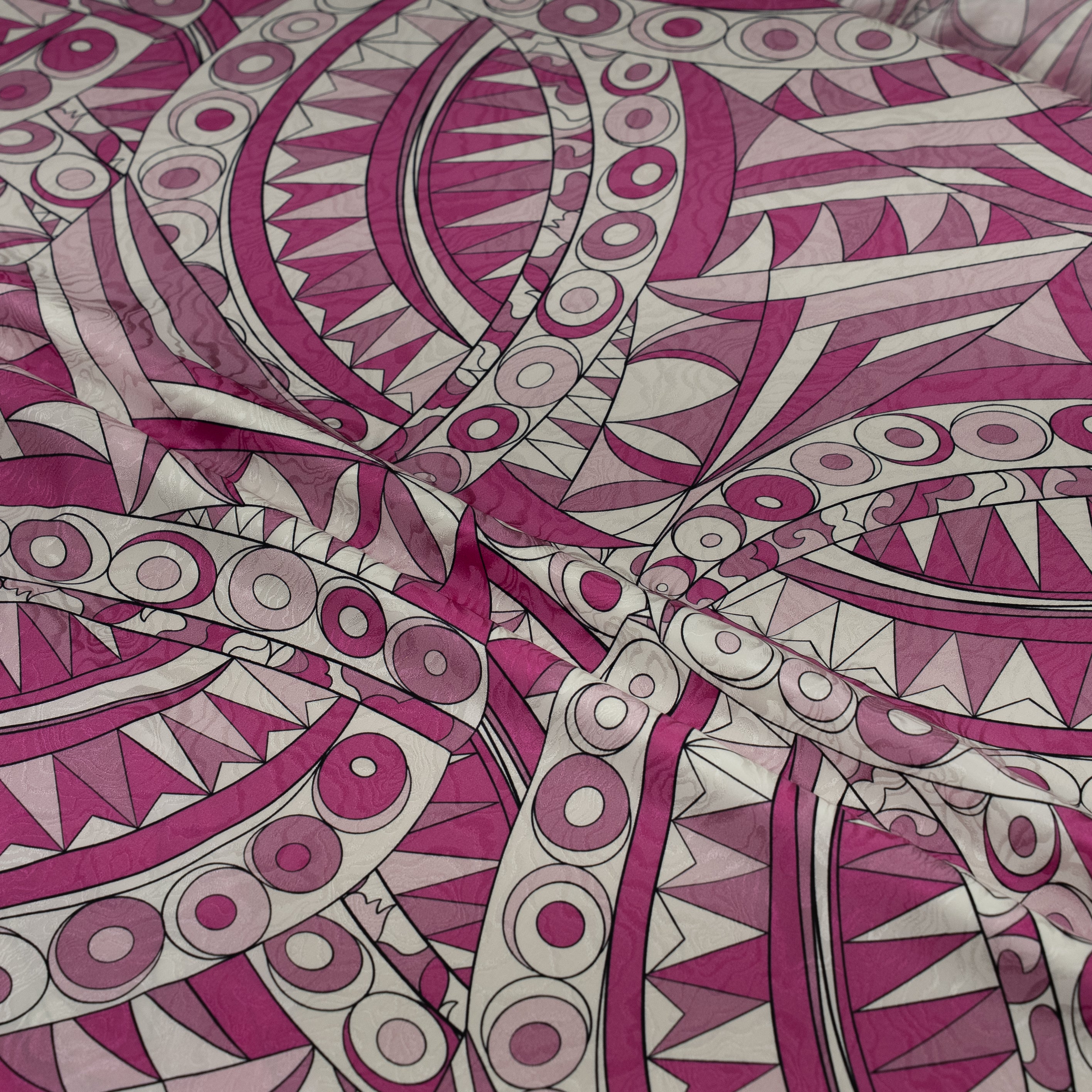 Close-up of pink and white geometric patterned fabric