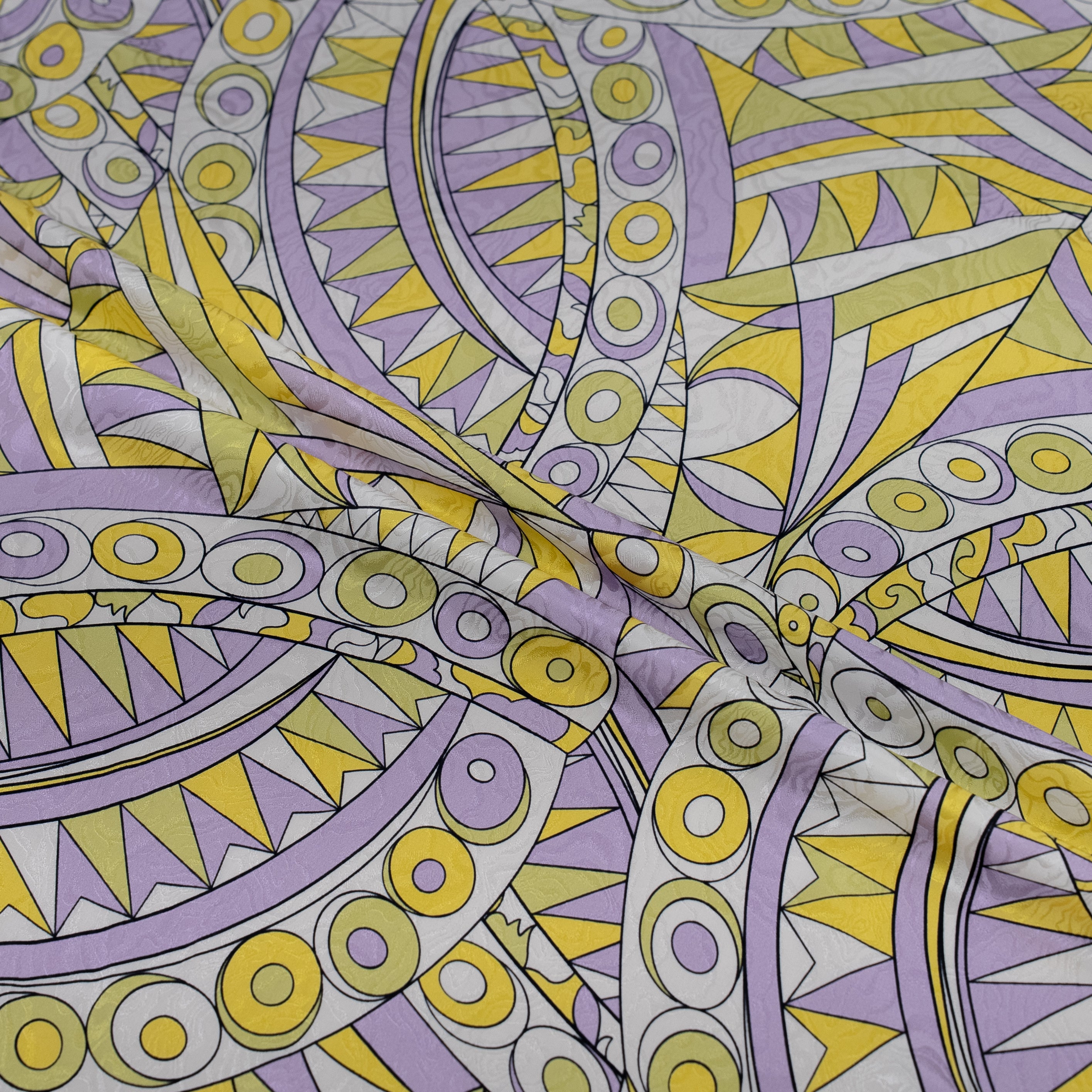 Geometric pattern with purple and yellow colors on a fabric background