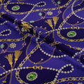 Decorative fabric with jewelry patterns on a blue background