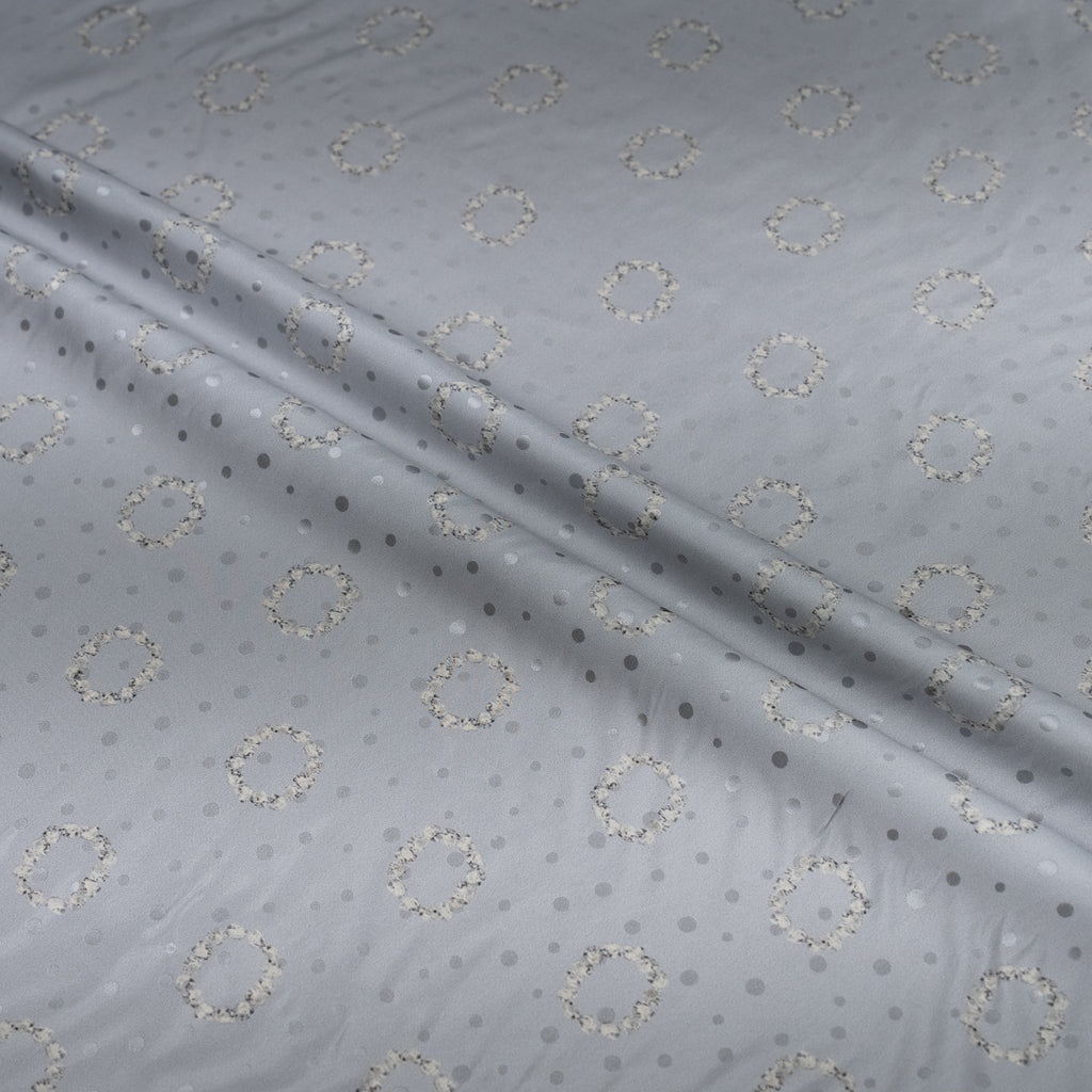 Gray fabric with circular pattern