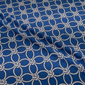 Blue fabric with white geometric pattern