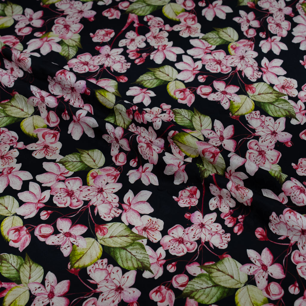 Floral pattern with pink and white flowers on a black background