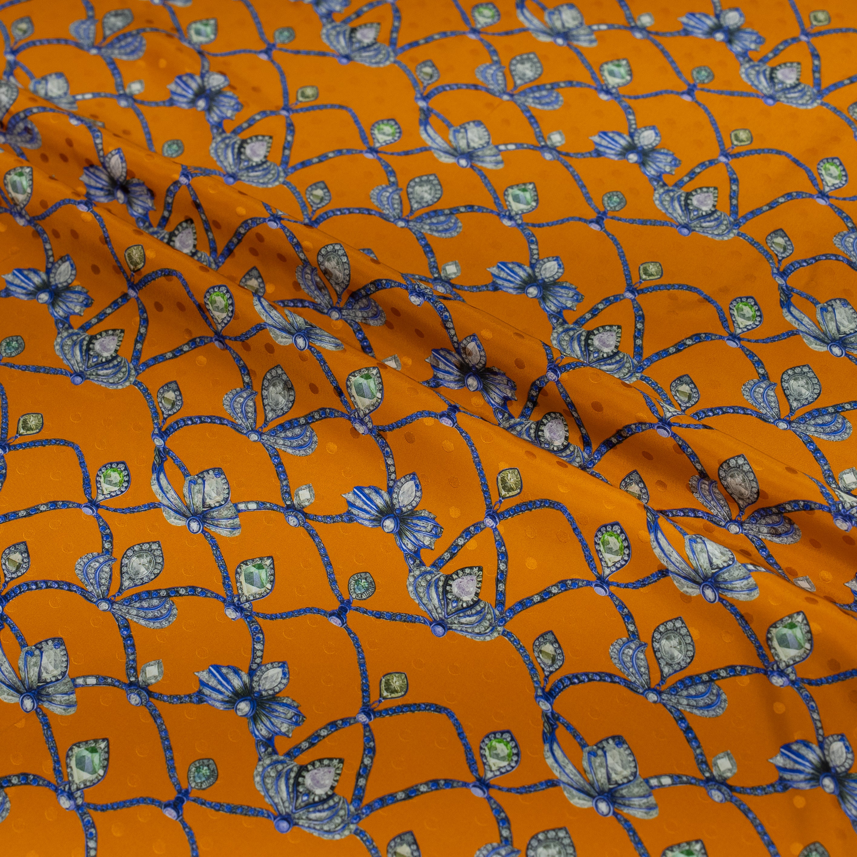 Orange fabric with blue jewel pattern