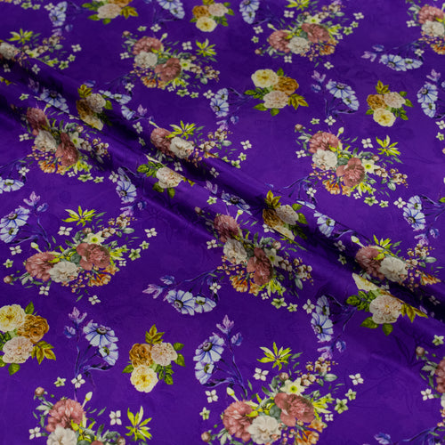 Floral pattern on purple silk fabric