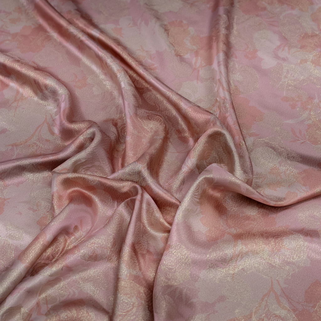 Pink floral patterned fabric with a satin finish